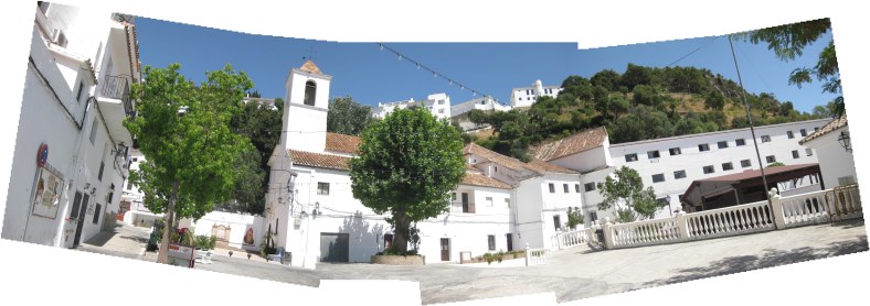Panorámica de la Plaza del Llano. Acceso desde la cuesta de las Piletas e iglesia de la Encarnación